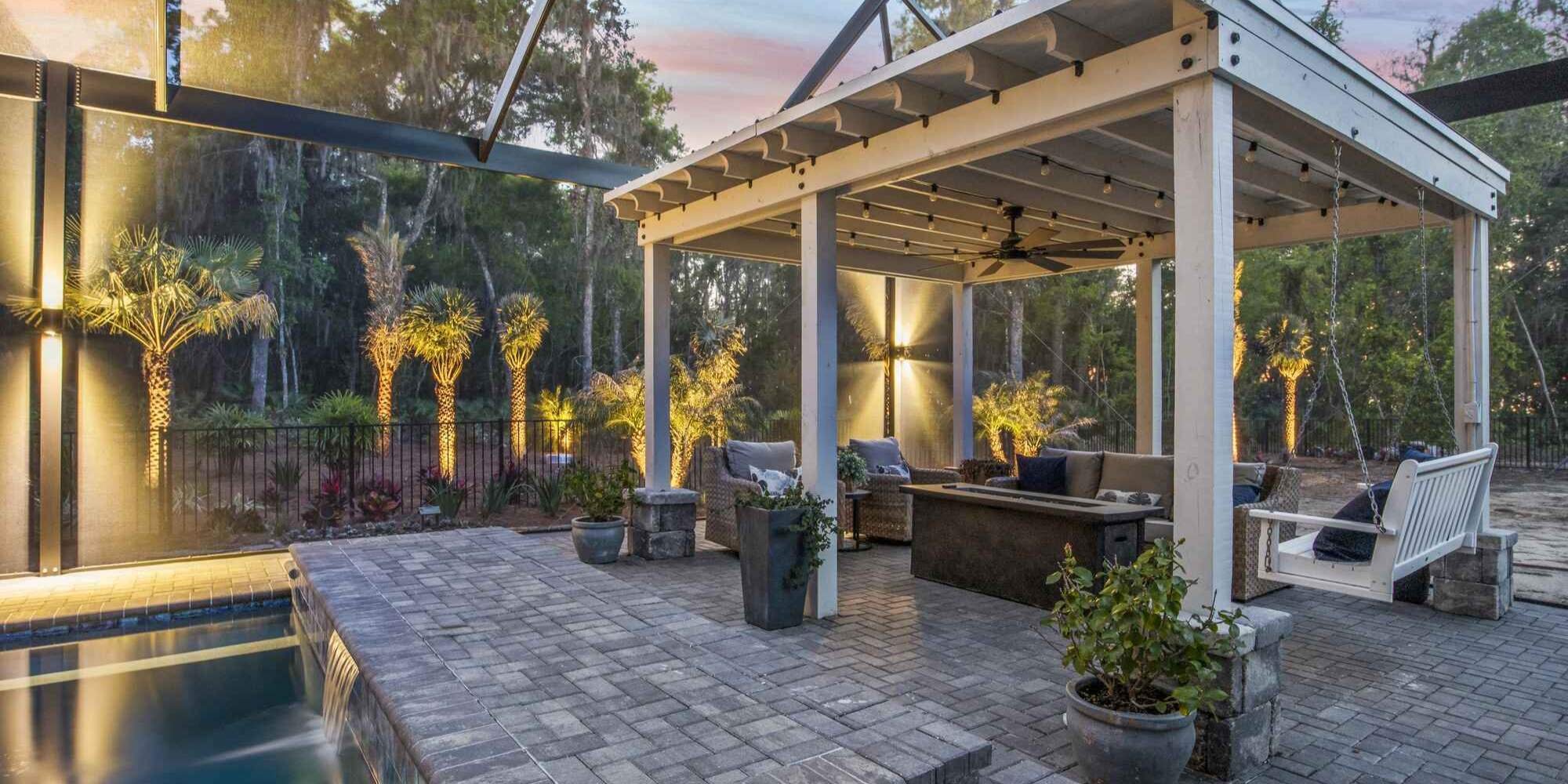 Ambient enclosure lighting with pergola by Impact Enclosures in Jacksonville, FL