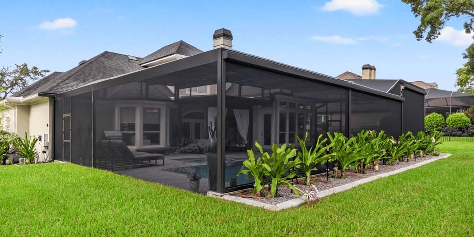 Image of an outdoor screen enclosure in Jacksonville, FL by Impact Enclosures