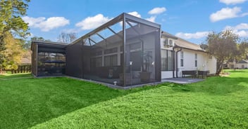 Screen enclosed outdoor living space by Impact Enclosures in Jacksonville, FL