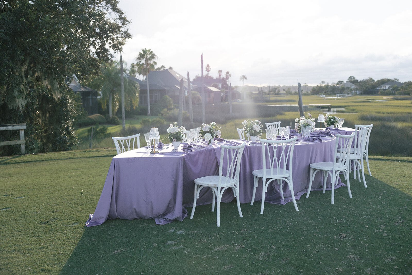 Outdoor table setup at marsh landing golf course - Impact Enclosures - Top Golf Communities in Jacksonville