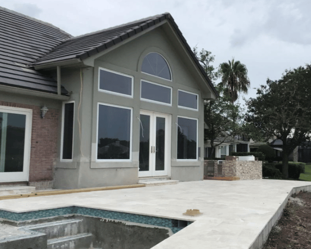 Before and After Pergola and Motorized Screen Outdoor Kitchen