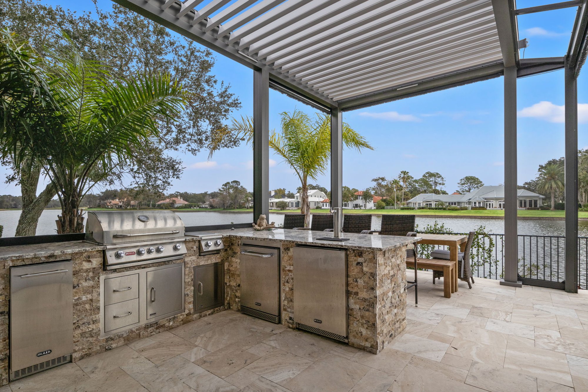 Outdoor Kitchen with a View and Dining Area in Jacksonville