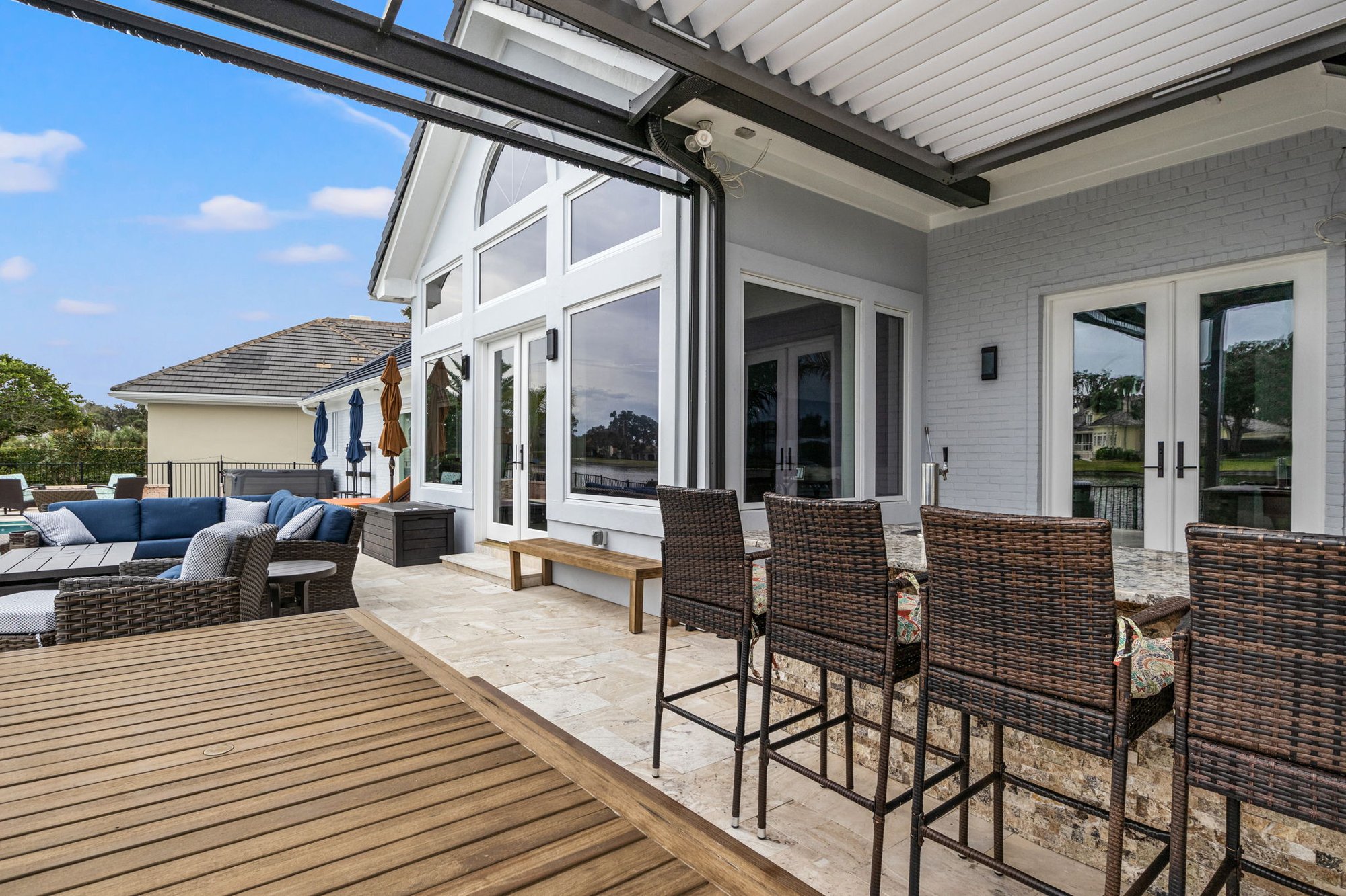 Outdoor Living Area in Jacksonville with Pergola and Dining Area