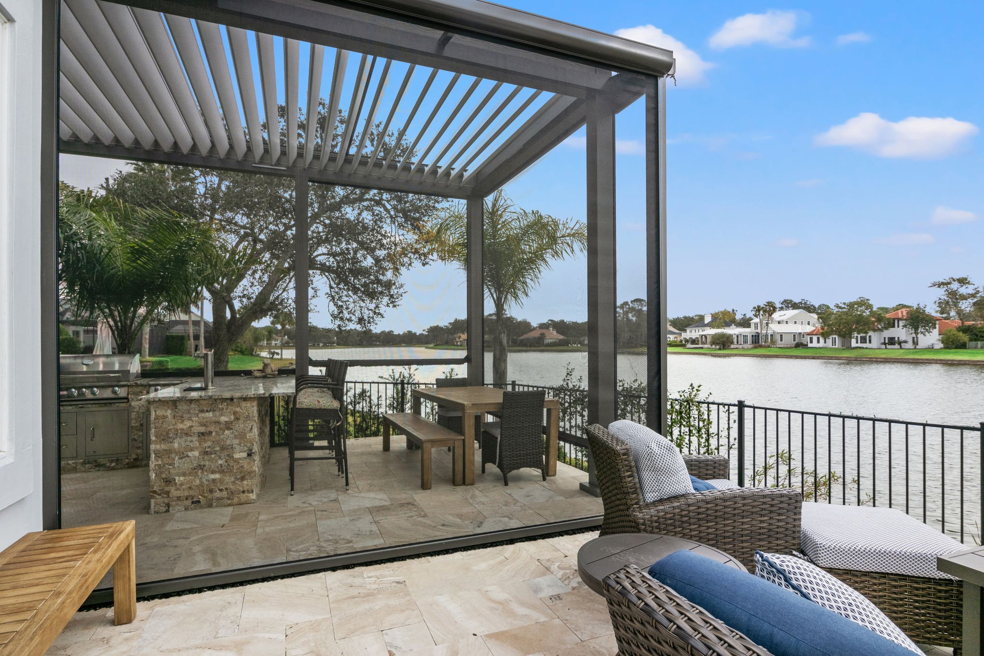 Smart Pergola with Motorized Screens Around Summer Kitchen in Jacksonville