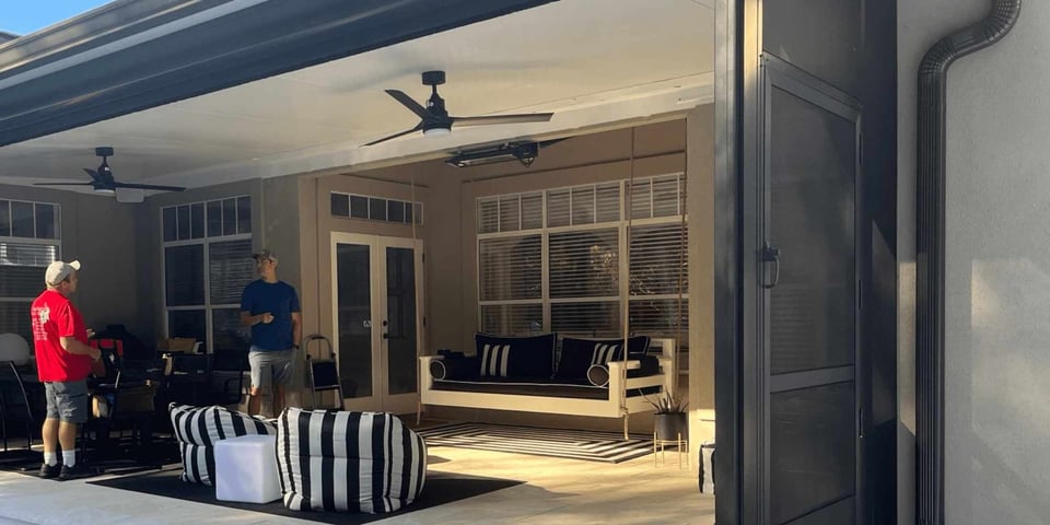 Image of a back patio with motorized screen by Impact Enclosures in Jacksonville, FL