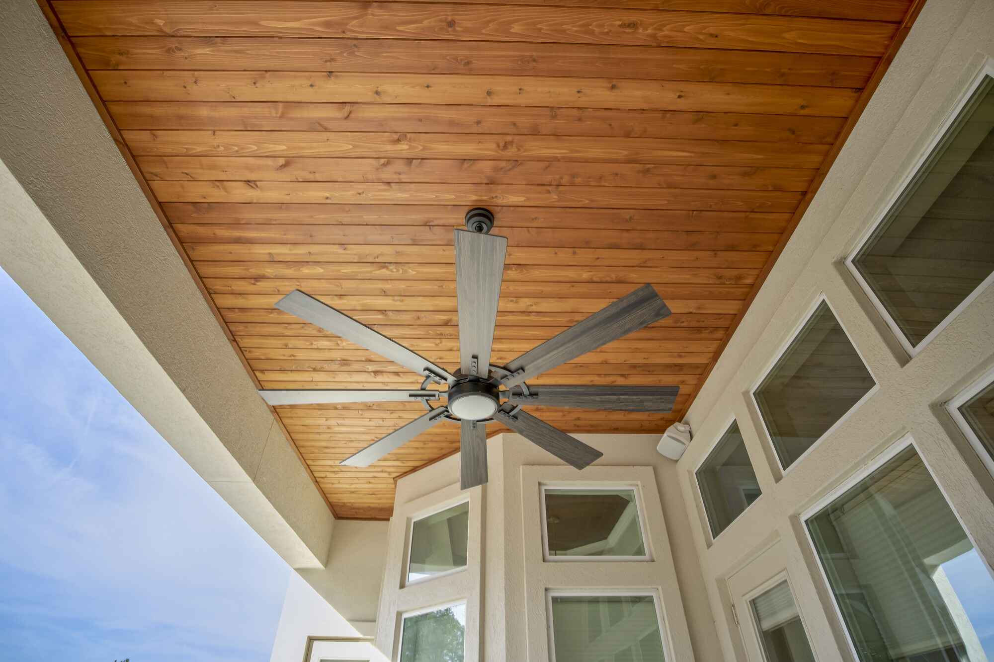 Natural Tongue and Groove Ceiling with Overhead Fan in Jacksonville