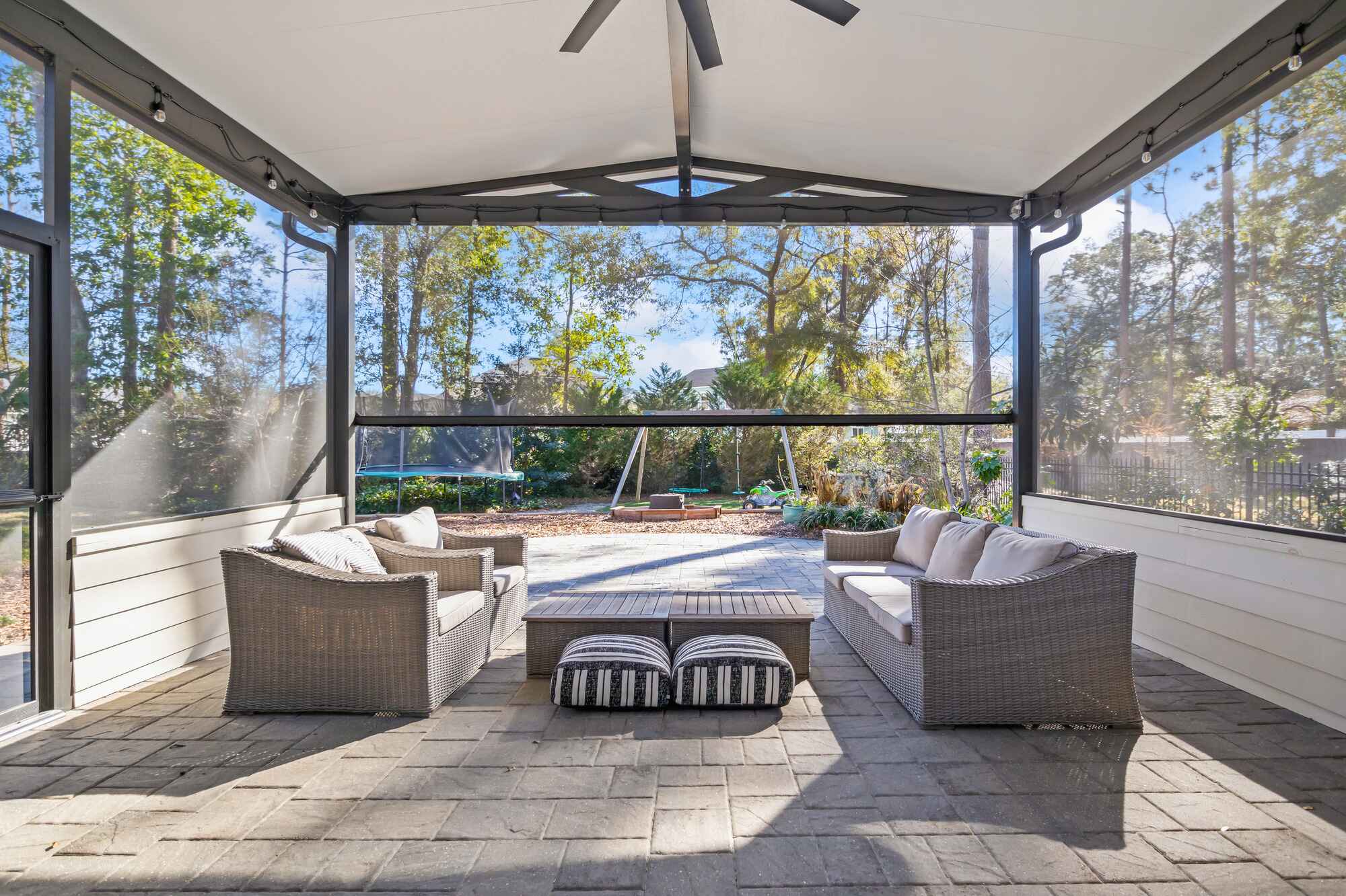Northeast Florida Patio with Motorized Screen and Black Ceiling Fan