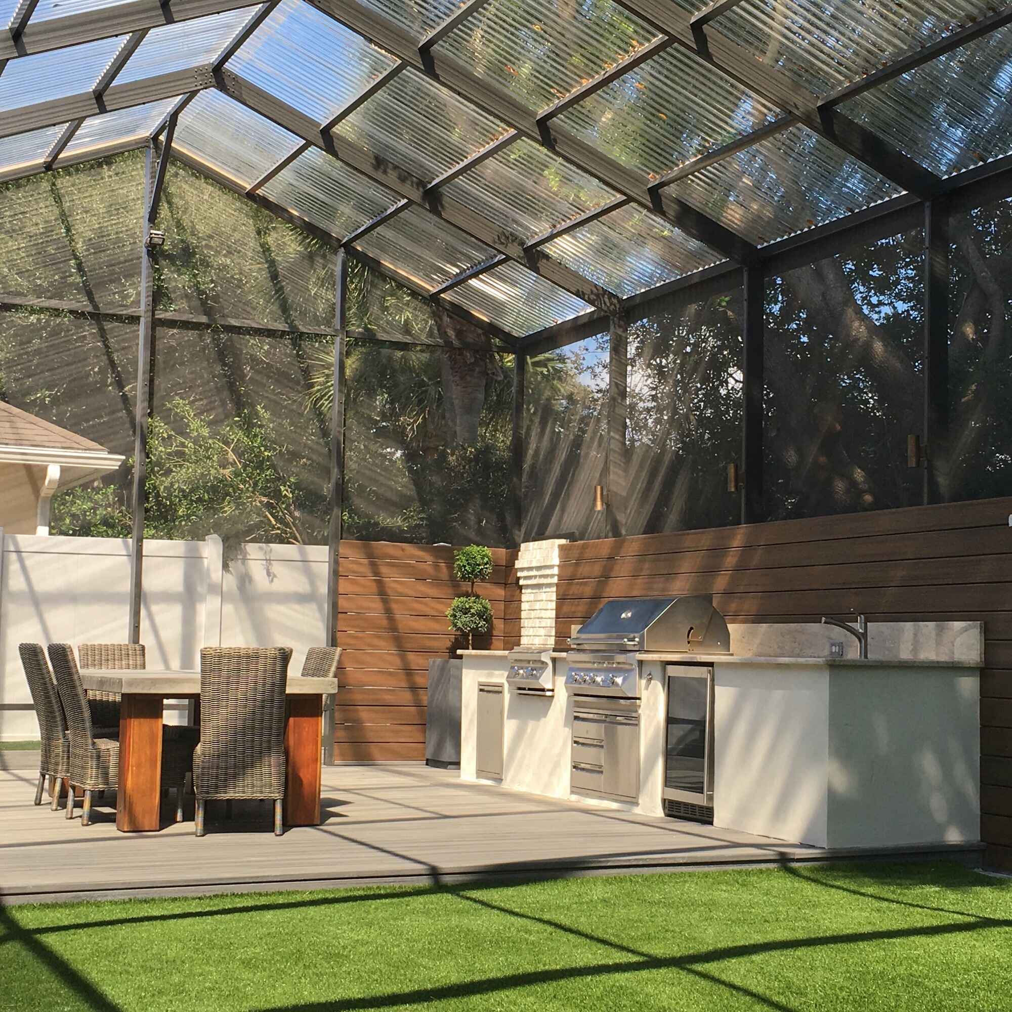 Outdoor Kitchen in Screen Enclosure with Motorized Louvered Roof